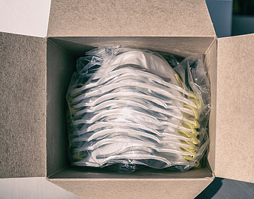 Maske verpackt im Kartin